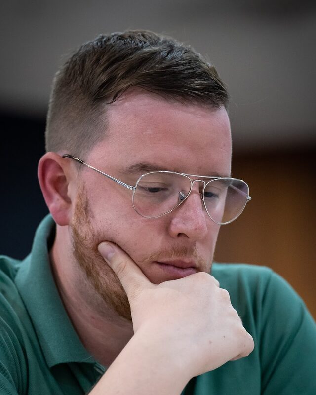Portrait of Flavio Corpa, thinking during a chess game